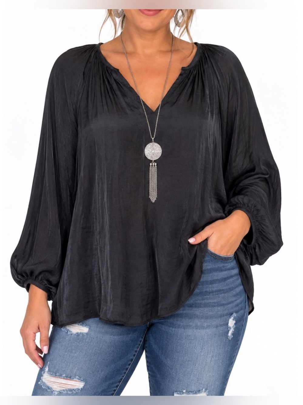 Rachel Roy black blouse featuring a flattering V-neckline, size Large